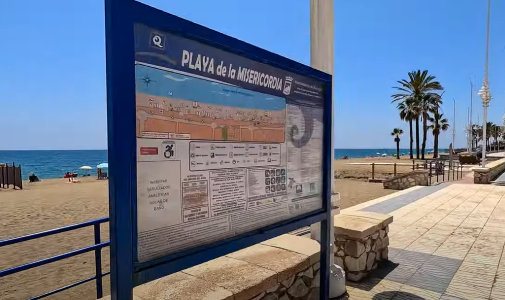 Playa de la Misericordia sign