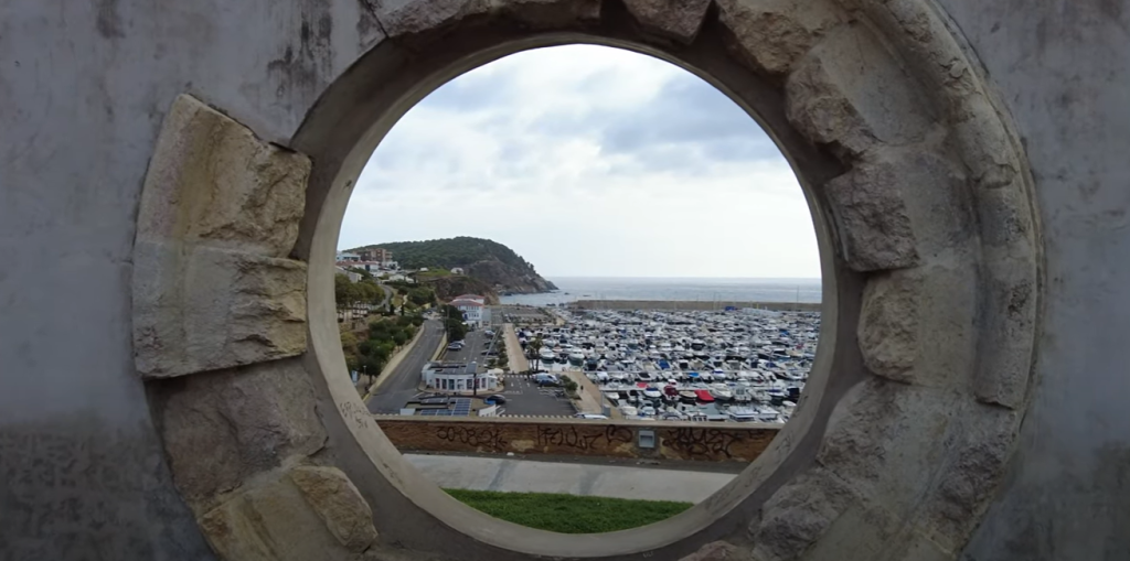 porthole view of Palamós Spain